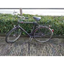 Herenfiets stationsfiets beschadigd