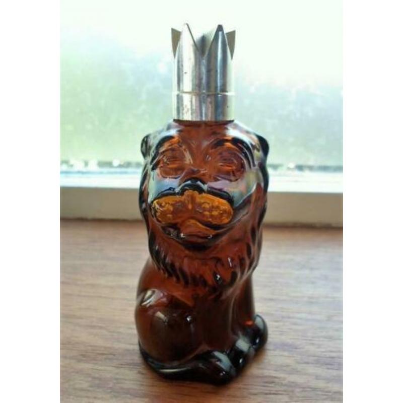 Moara Shira Aftershave fles in de vorm van een Leeuw.