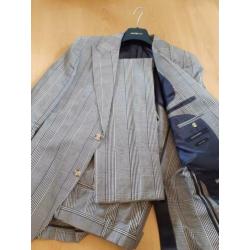 Nieuw, geruit Suitsupply pak, maat 50.