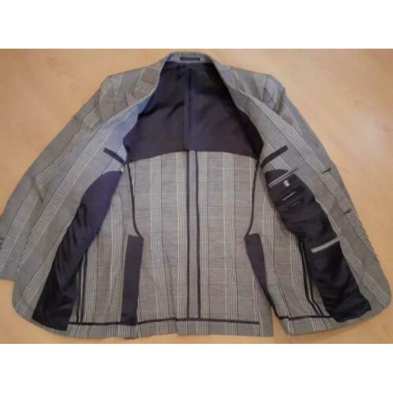 Nieuw, geruit Suitsupply pak, maat 50.