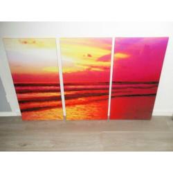 Mooi kleurrijk drieluik v/d ondergaande zon in zee - canvas