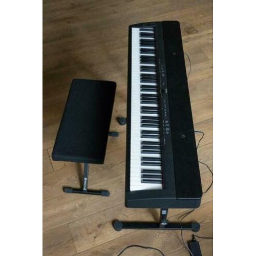 Piano met transportkist , onderstel en kruk