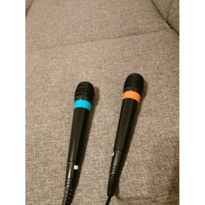 Playstation 2 met 2 controllers veel spellen en singstar