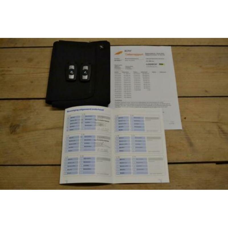 BMW 1 Serie 120i Business Line met navi en automaat!