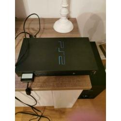 Playstation 2 met 2 controllers veel spellen en singstar