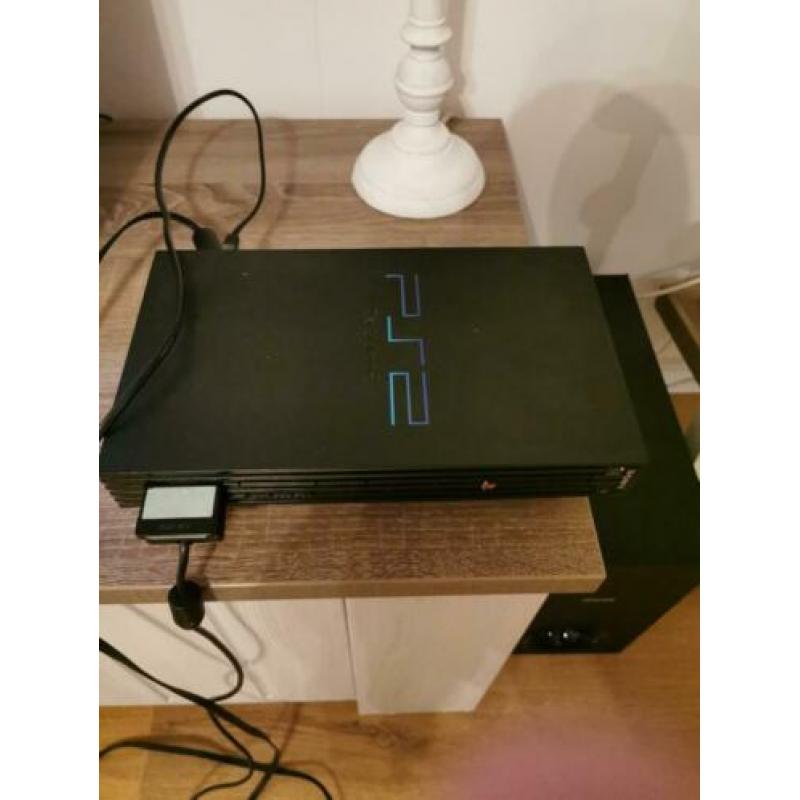 Playstation 2 met 2 controllers veel spellen en singstar