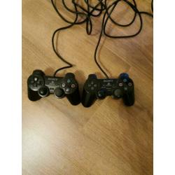 Playstation 2 met 2 controllers veel spellen en singstar