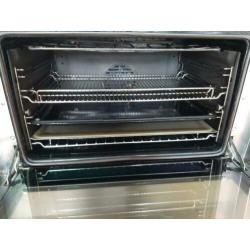 SMEG vrijstaand gasfornuis met SMEG RVS afzuigkap