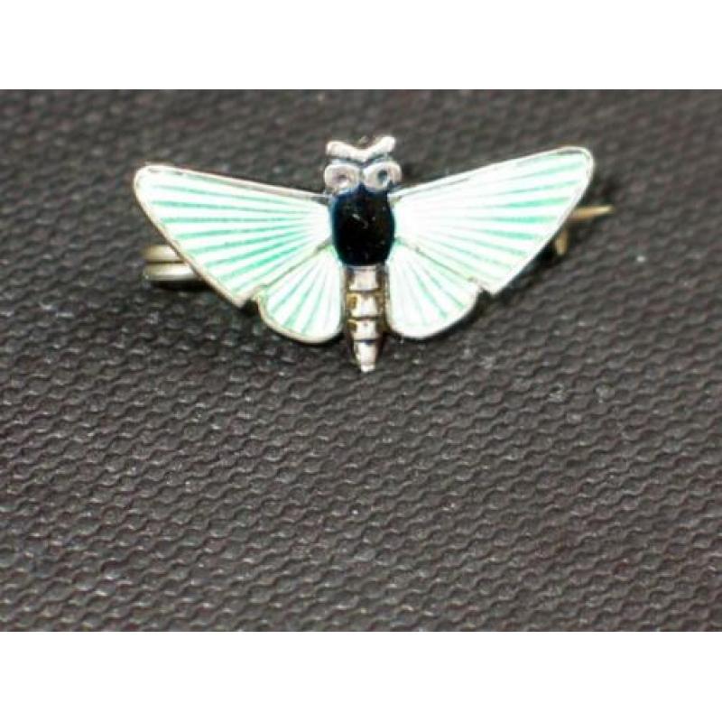 Art Deco zilveren vlinder broche groen en zwart emaille