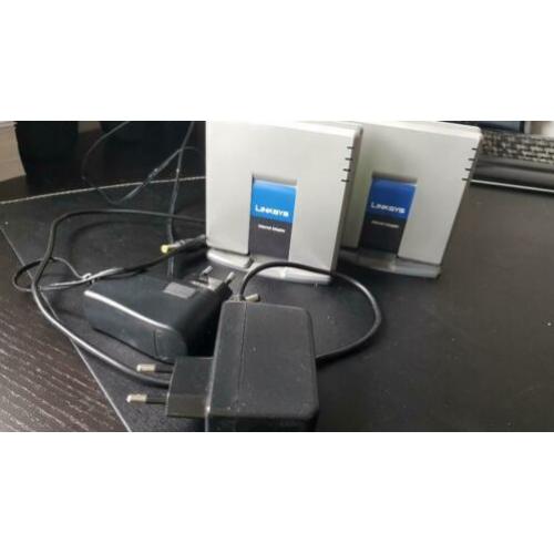 Te koop 3 Internet Phone adapters Linksys PAP2T