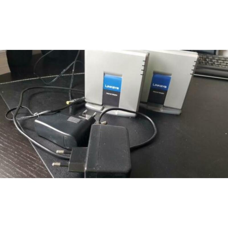 Te koop 3 Internet Phone adapters Linksys PAP2T