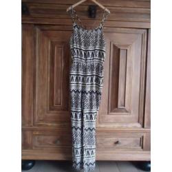 Nieuw met kaartje:zwart dessin jumpsuit van Meis&Mint, mt S.