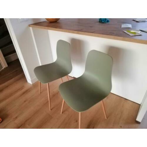 Groene kuipstoelen