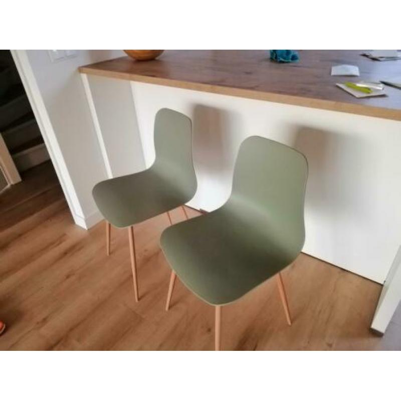 Groene kuipstoelen
