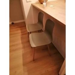 Groene kuipstoelen