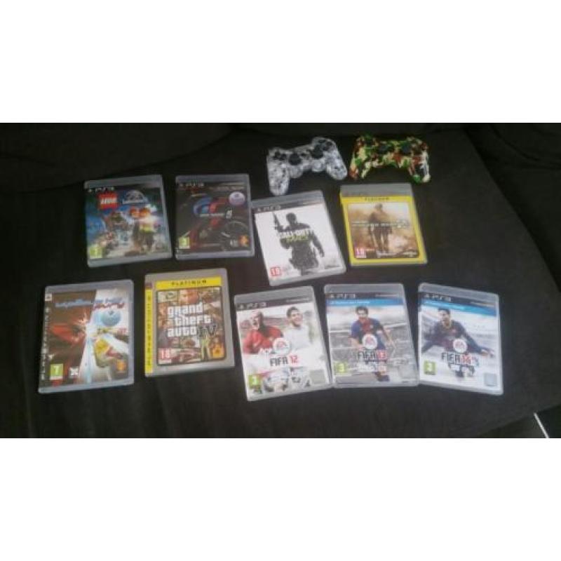 Playstation 3 met 9 spellen en 2 controllers