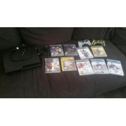 Playstation 3 met 9 spellen en 2 controllers
