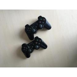 Playstation 3 + 2 controllers & spellen!
