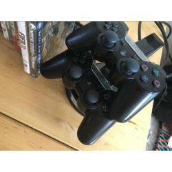 PS3 met 17 spellen en toebehoren
